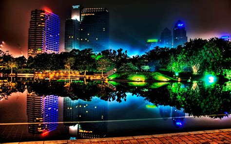Download Mesmerizing Night View Of A Vibrant City Wallpaper