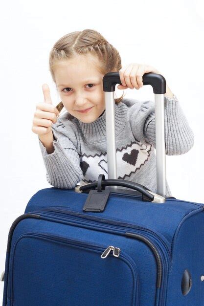 Premium Photo Girl With Suitcase