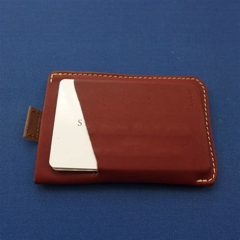 It is currently holding 8 cards, 3 bills, and a check. Bellroy Card Sleeve Review — Everyday Commentary
