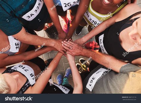 Athletic Teamwork Hands Images Stock Photos And Vectors Shutterstock