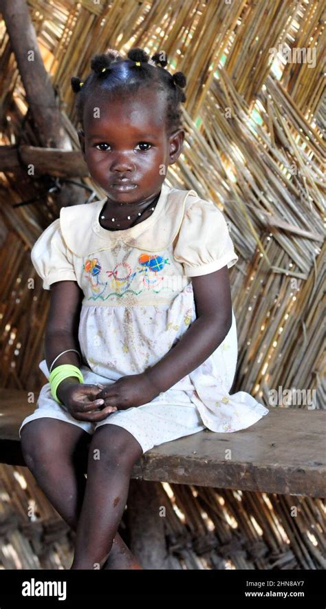 A Beautiful Little Burkinabe Girl From Central Burkina Faso Stock Photo