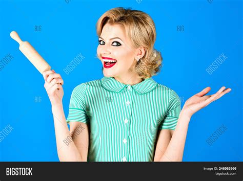 Pin Woman Holds Image And Photo Free Trial Bigstock