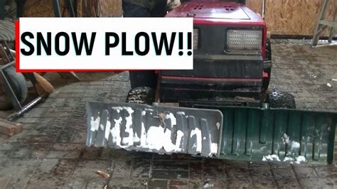 Snow Plow On Lawn Mower Youtube