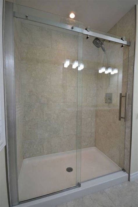 How your shower door opens depends on your style preferences and your bathroom layout. shower pan with sliding glass door in bathroom | Bathroom ...