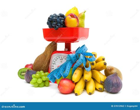 Fruit Kitchen Scale And Measuring Tape On A White Background Stock