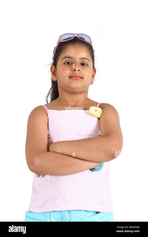 Girl Standing With Arms Crossed Stock Photo Alamy