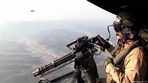 Us Marines Helicopter Door Gunners In Action Urban Close Air