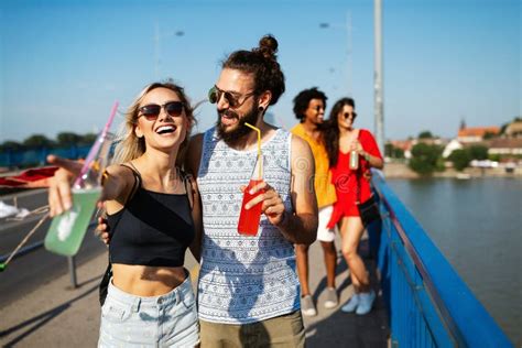 Group Of Happy Friends People Having Fun Together Outdoors Stock Photo