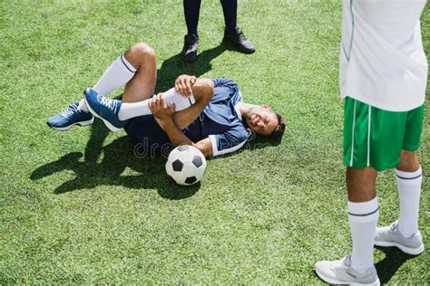 Injured Soccer Football Player On Cru Stock Photo Image Of Concept