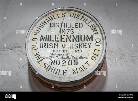 Millennium Irish Whiskey Sign In Old Bushmills Distillery On Wooden