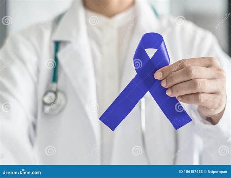 Dark Blue Ribbon For Colon Colorectal Cancer Awareness On Medical