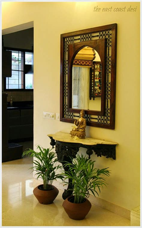 Indian homes are notably adapting to modern interiors that are flexible and specifically designed to white modern sliding doors make life easier in your small indian home. Entry way ideas | Luxury living room design, Indian home ...