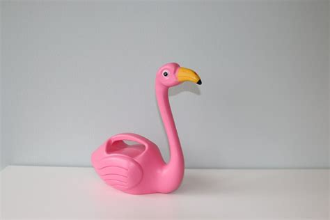 Pink Flamingo Plastic Toy On White Table Photo Free Flamingo Image On Unsplash In 2020