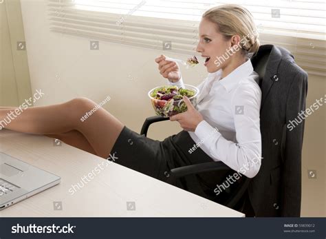 Young Businesswoman Eating Salad Her Office Stock Photo 59839012