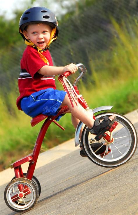 Happy Boy On Tricycle Stock Image Image Of Helmet Happy 5080667