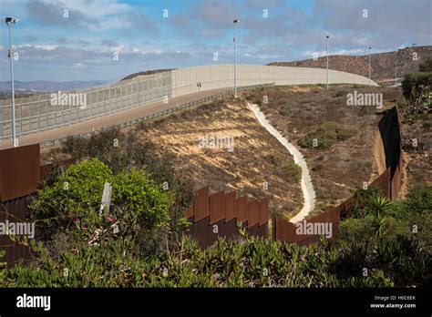 Tijuana Mexico Multiple Fences Run Along The Us Mexico Border Near