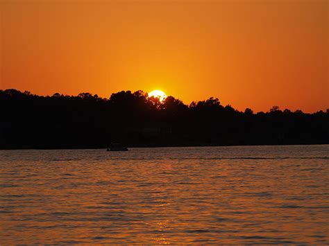 Lakeshore Sunset Photograph By Georgia Threet