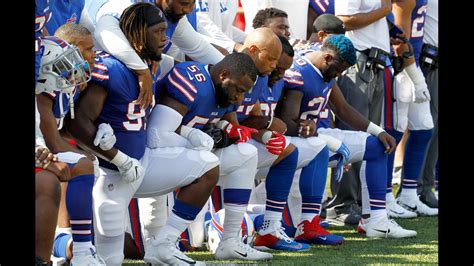 Fact Check Do Nfl Rules Require Players To Stand During The National Anthem