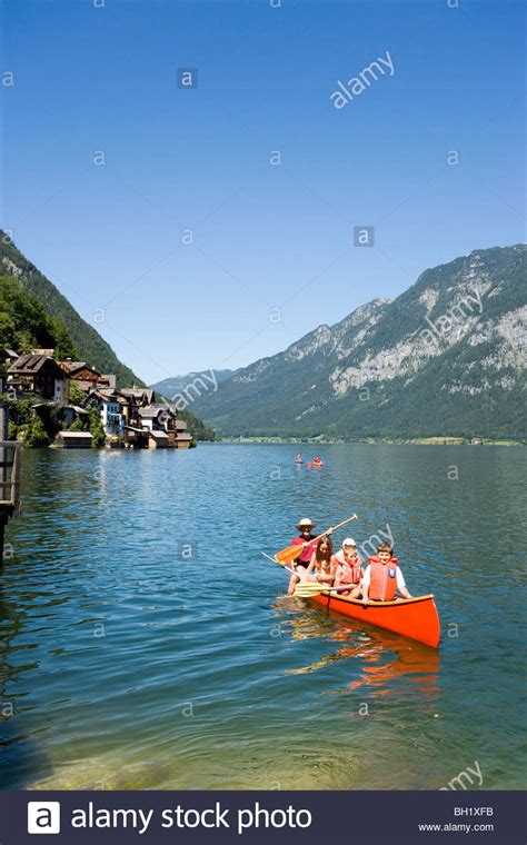 Children In A Canoe Lake Hallstatt Hallstatt Salzkammergut Upper