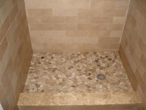Scrubbed it and rinsed it with cool water. River stone shower floor | New Jersey Custom Tile