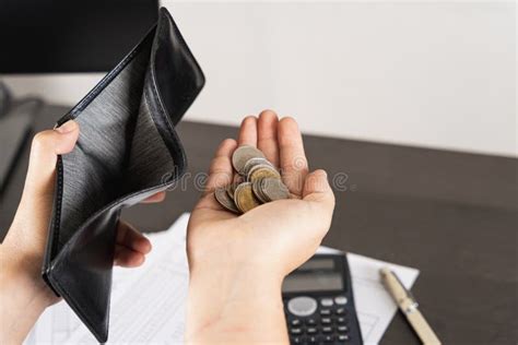Poor Asian Man Hand Open Empty Wallet And Holding Coins Looking For Money Having Problem