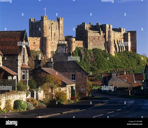 The Village Of Bamburgh On Northumberland Coast In England Is Stock