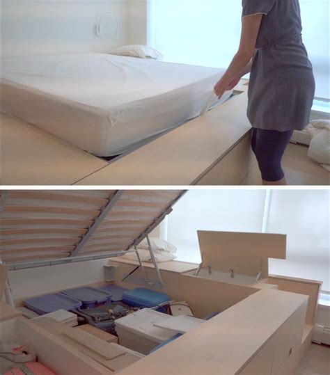 A Platform Bed Was Built For This Small Bedroom With Storage Under And