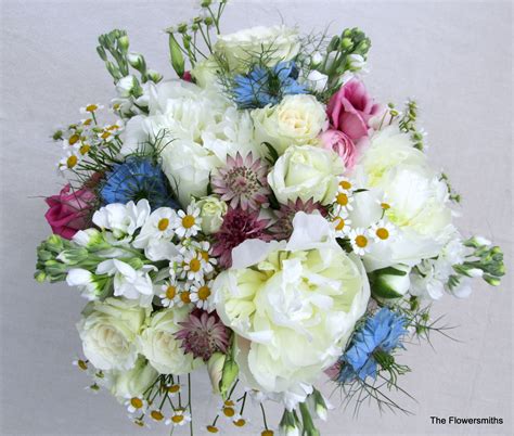 Keep reading to see what makes us think of spring, but remember, you can use these beautiful arrangements and. Wedding bouquet with Spring flowers and peonies by www ...