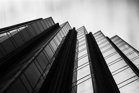 Grayscale Photo Of A High Rise Building · Free Stock Photo