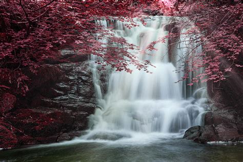 Majestic Waterfall In Forest Landscape Image With Added Drama Of