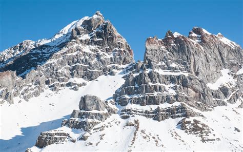 Download Wallpaper 1680x1050 Mountain Snow Peak Landscape White