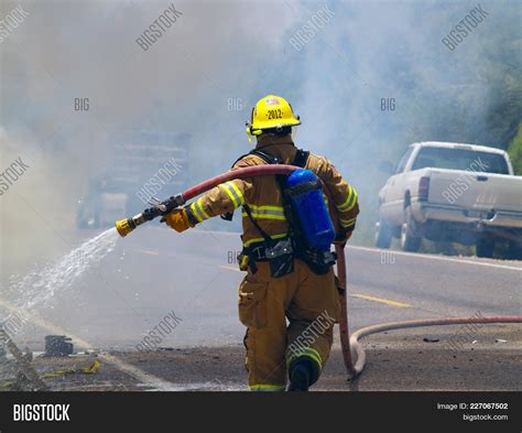Firefighter Walking Image And Photo Free Trial Bigstock