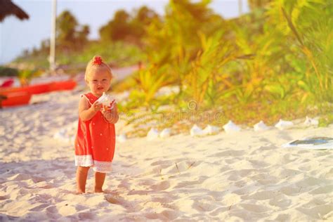 Cute Little Girl With Shell On Tropical Beach Stock Image Image Of