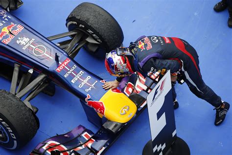 korean grand prix sunday 6 october sebastian vettel strokes his car after the race grand