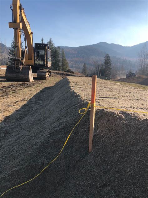 A tank where solids settle to the bottom and a drainfield (also known as a leachfield) where the water disperses. Guide To Understanding Mound Septic Systems, Sand ...