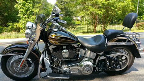 Bought the leg fairings for both bikes, as well. DELUXE vs Heritage Road King Street Glide Fatboy Electra ...