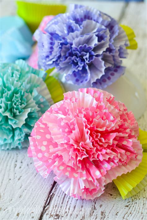 A few simple materials you probably already have at home, and you'll have a sweet paper flower craft. Cupcake Liner Flowers - Typically Simple