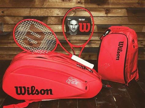 Send enquiry for chanel white with black tennis racket & ball. wilson tennis bag and tennis racquet . roger federer ...