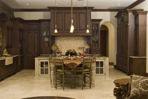 Mediterranean Kitchen Created With Woodmode Cabinetry Center Island