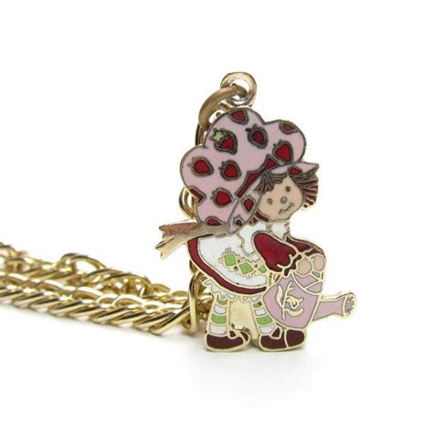 This Vintage Bracelet Features A Charm With Strawberry Shortcake