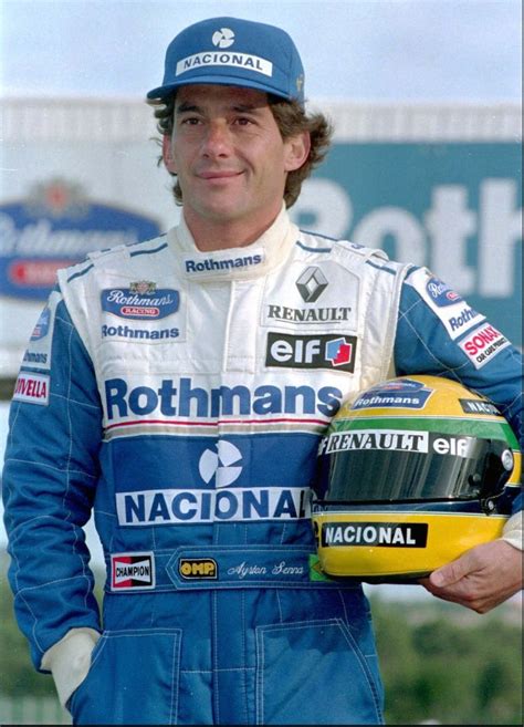Three Time Formula One World Champion Ayrton Senna Of Brazil Poses For Photographers During The