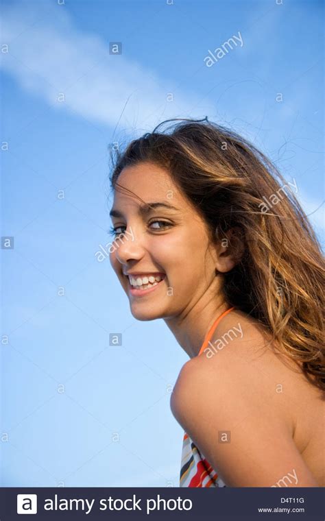 Portrait Of Teenage Girl Wearing Bikini On Beach Stock