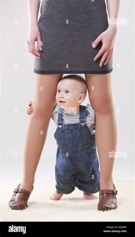 Baby Between Legs Mom Hi Res Stock Photography And Images Alamy