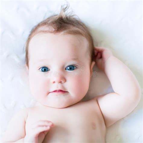 Adorable Blue Eyed Baby On A White Knit Blanket Stock Photo Image Of