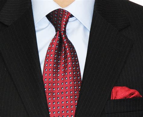 The half windsor is a clean, triangular shaped knot—thick, but not quite as thick as a windsor. How to Tie the Half-Windsor Tie | How to tie a tie