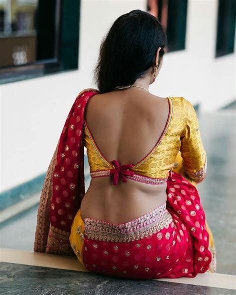 Saree Seduction Gorgeous Woman In Red Saree And Yellow Backless Blouse