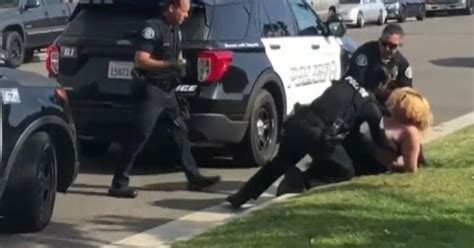 california cop punches handcuffed woman in face caught on video cbs news