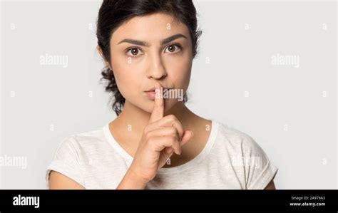 Headshot Portrait Serious Indian Woman Showing Hush Gesture Close Up