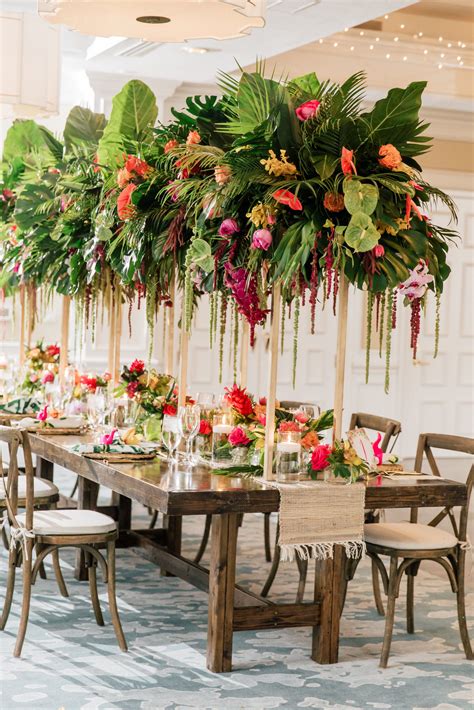 Tall tropical greenery garden wedding centerpiece | Garden wedding
