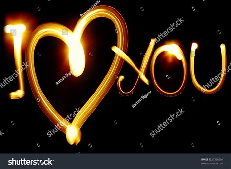 I Love You Phrase Created By Light Over Black Background Stock Photo